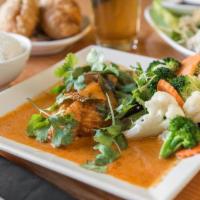 Sp2 Thai Style Catfish · Fried & covered with curry. Served with steamed vegetables.