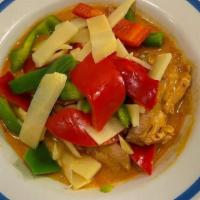 #24 Red Curry · This is classic Thai curry. Simmered in coconut milk with bamboo shoots & peppers.