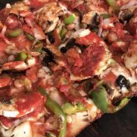 The Cadillac (Supreme) · Red sauce, Sausage, Pepperoni, Green Peppers, Mushrooms, Onions, Olives.