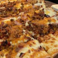 The Big Three · BBQ Sauce, Ground Beef, Bacon, Canadian Bacon, Cheddar Cheese.