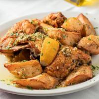 Pollo Vesuvio · half chicken with potato wedges baked with extra virgin olive oil, garlic, potato wedges, wh...