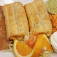 Tu Casa Chimichangas · Two deep fried flour tortillas filled with cheese and your choice of chicken, ground beef, s...