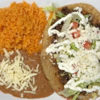 Huarache · Deep fried corn dough with your choice of chicken, steak, pork or ground beef topped with le...