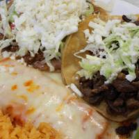 Tu Casa Combination · One cheese enchilada, steak taco and ground beef tostada.