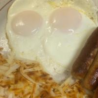 Two Eggs, Meat & Hash (520-1200 Cal) · With hash browns, ham or (4) bacon or (4) sausage links or (2) patties.