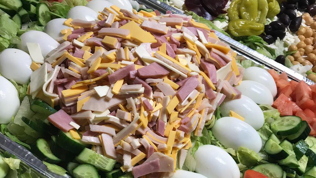 Chef'S Salad (370-390 Cal) · Crisp lettuce, with turkey, ham, Swiss and American cheese,
tomato, and hard-boiled egg.