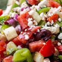 Xtro Greek Salad · Iceburg, tomato, red onion, cucumber, carrots, feta cheese, peppers, pepperoncini, kalamata ...
