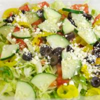 Greek Salad · Lettuce, Tomatoes, Cucumber, Oliver,Pepper Shine, and Feta  cheese.