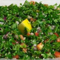 Tabouli Salad · Parsley, red onions, tomatoes, bulgar (wheat), fresh lemon juice, olive oil.