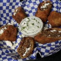  Gyrolls · 3 egg rolls stuffed with juicy gyro meat, feta and grilled onions.