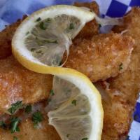 Saganaki Sticks · Traditional Greek Saganaki Cheese deep fried to a golden brown and served with squeeze of le...