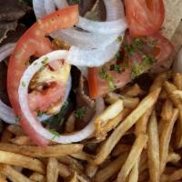 Gyro Platter · Platter includes 2 skewers of protein pita and choice of 2 sides.