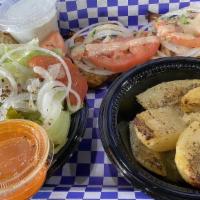 Shrimp Platter · Platter includes 2 skewers of protein pita and choice of 2 sides.