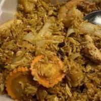 Hawaiian Fried Rice · Fried rice w/chicken and shrimp, egg, pineapple, onion, tomatoes, carrot & cashew.