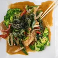 Spicy Basil Fish · Crispy tilapia fillet topped w/green bean, onion, bell pepper in basil sauce.
