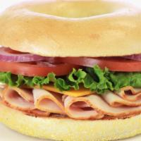 Turkey Sandwich · Includes lettuce, tomato, onion, mayo, mustard, pickle spear.