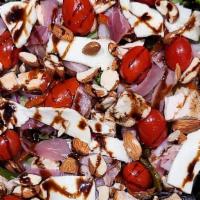 Kowil Wood Chicken And Prosciutto Salads · Italian prosciutto and shaved grilled chicken breast, french mozzarella, crushed honey roast...