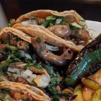 Tacos · Corn or Flour Tortillas, Steak, Chicken, Pork, Ground Beef, Tongue, Head, Barrie, Tripas, Ce...