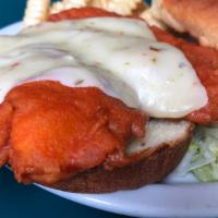 Buffalo Chicken Sandwich · Breaded  or grilled and tossed in our spicy buffalo sauce, topped with pepper jack cheese on...