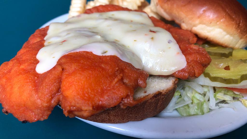 Buffalo Chicken Sandwich · Breaded  or grilled and tossed in our spicy buffalo sauce, topped with pepper jack cheese on a brioche bun.  Served with bleu cheese or ranch.