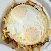 Country · Bacon, ham, sausage, onion pepper, mushroom, jack and cheddar topped with country gravy and ...