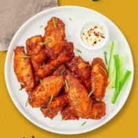 Wing Fling · Classic bone-in wings oven- baked, cooked to order perfectly crisp, and tossed with your cho...