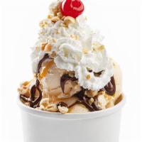 Small Sundae · 2 or 3 Ice Cream scoops served with whipped cream, crushed nuts and your choice of sauce