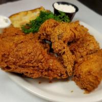 Fried Chicken Basket · Three pieces of chicken breaded and deep fried until golden brown.