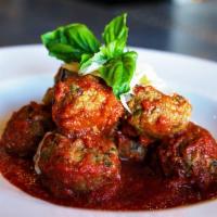 Andre'S Mini Meatballs · A new version of an old favorite. Pork and beef meatballs in house marinara with fresh herbs...