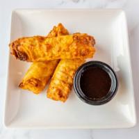 Egg Rolls · Traditional pork egg rolls served with Asian dipping sauce.