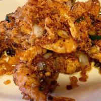 Peking Shrimp · Fried shrimp stir fried with sweet and sour Peking sauce.