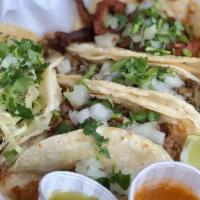 5 Street Tacos · Soft corn tortilla with your choice of meat, topped with cilantro and onion with a wedge of ...