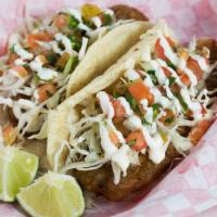 2 Taco Ensenada · Your choice of fried fish or shrimp on a corn tortilla with cabbage, pico de gallo and our s...