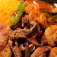 Fajita Plate · Your choice of chicken or beef, cooked with bell peppers, and onions. accompanied with flour...
