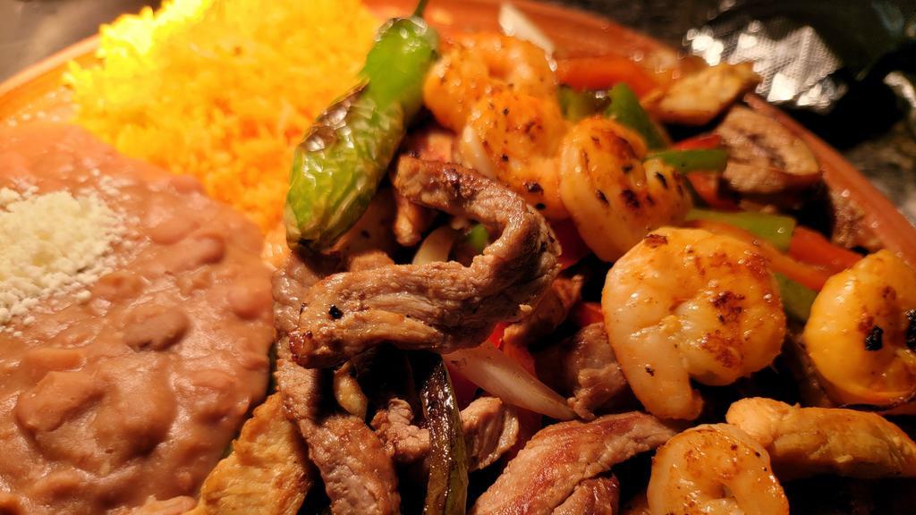 Fajita Plate · Your choice of chicken or beef, cooked with bell peppers, and onions. accompanied with flour or corn tortillas.