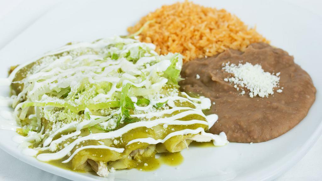 Green Enchilada Plate · Your choice of 3 enchiladas. Green sauce filled with chicken topped with lettuce, cheese, and sour cream. Please contact merchant for enchiladas selection.