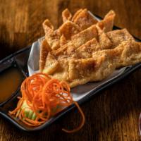 5 Pieces Crab Rangoon · Imitation crab meat, cream cheese and celery in wonton wrapped and deep fried.