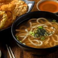 Tempura Udon Soup · Thick udon noodles simmered in chicken broth served with shrimp and vegetable tempura.
