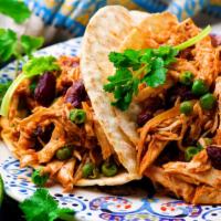 Shredded Chicken Taco · Vietnamese style grilled chicken serve with tortilla and tacos toppings.
