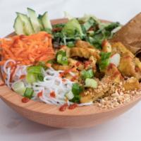 Curry Tofu Bowl · Vietnamese Curried Tofu crispy and juicy vegetarian option serve with noodles, mixed greens,...