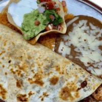 Fajita Quesadilla · Flour tortilla with your choice of steak or grilled chicken, grilled onions, green peppers, ...