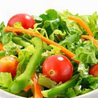 Garden Salad · Lettuce, tomatoes, cucumbers, carrots, and green peppers.