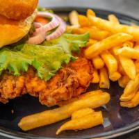Taildragger Tenderloin Sandwich · Grilled or breaded, includes lettuce, onions, tomato, and pickles