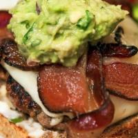 Turkey Burger · White cheddar, nitrate-free bacon, roasted tomatoes, onion, house-made pickles, jalapeno-chi...