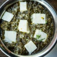Palak Paneer · Spinach and homemade indian cheese cubes cooked with onions, tomatoes, mild spices and fresh...