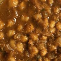 Chana Masala · Chickpeas cooked in a mildly spiced onion and tomato gravy.