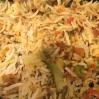 Vegetable Biryani * · Saffron flavored rice prepared with fresh vegetables, specially imported herbs, spices, and ...