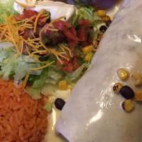 Beef Burrito · Served with rice and beans.