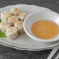 Shrimp Dumplings (7) · Deep-fried or steamed, these shrimp dumplings (shu-mai) are served alongside a tasty special...