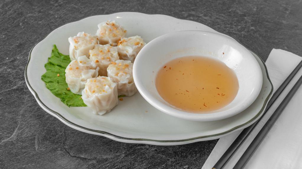 Shrimp Dumplings (7) · Deep-fried or steamed, these shrimp dumplings (shu-mai) are served alongside a tasty special sauce and roasted garlic.